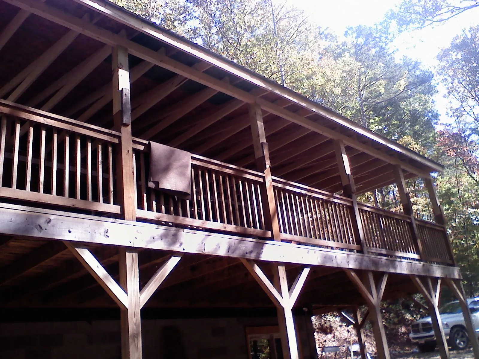 Timber framing under a new elevated porch and deck — Roof Leak Repair in Venango by Roofing Brothers